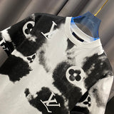 Close-up detail shot of Louis Vuitton cotton t-shirt with signature branding