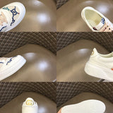 Side profile of Gucci crisp white sneakers cushioned comfort fit