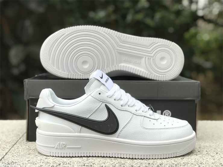 Side profile of Nike neutral cream sneakers streetwear statement look