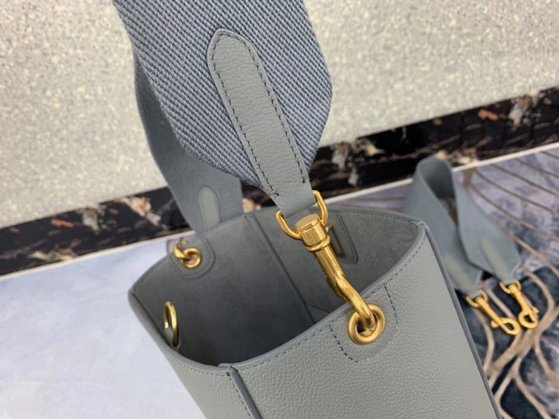 Side profile of elevated signature women's handbag – women's luxury handbag