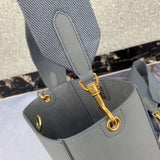 Side profile of elevated signature women's handbag – women's luxury handbag
