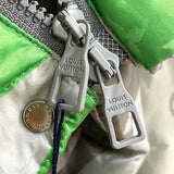 Flat lay presentation of Louis Vuitton luxury clothing with logo-detail design
