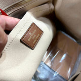  statement top-handle bag styled with outfit 18