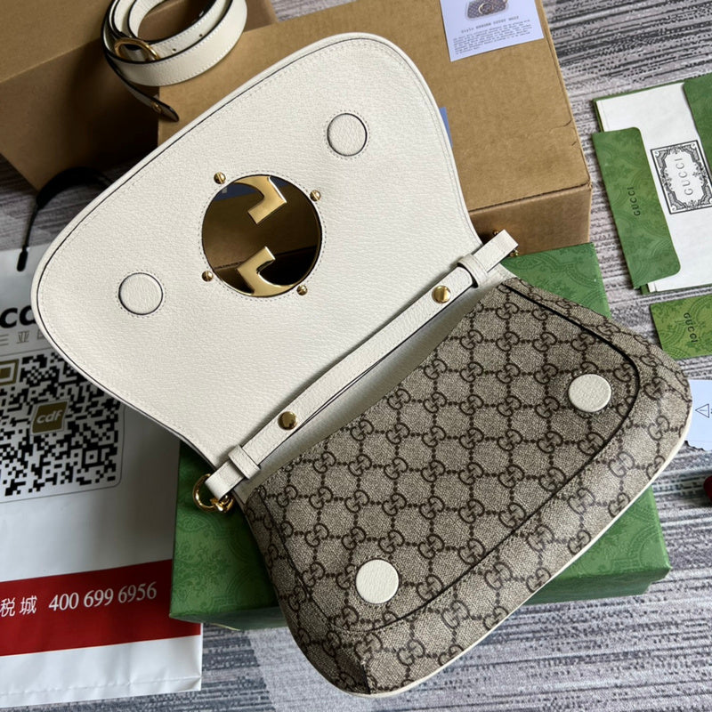 Front view of chic polished women's handbag – women's statement bag