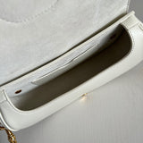 Side profile of premium sleek women's handbag – women's luxury accessory