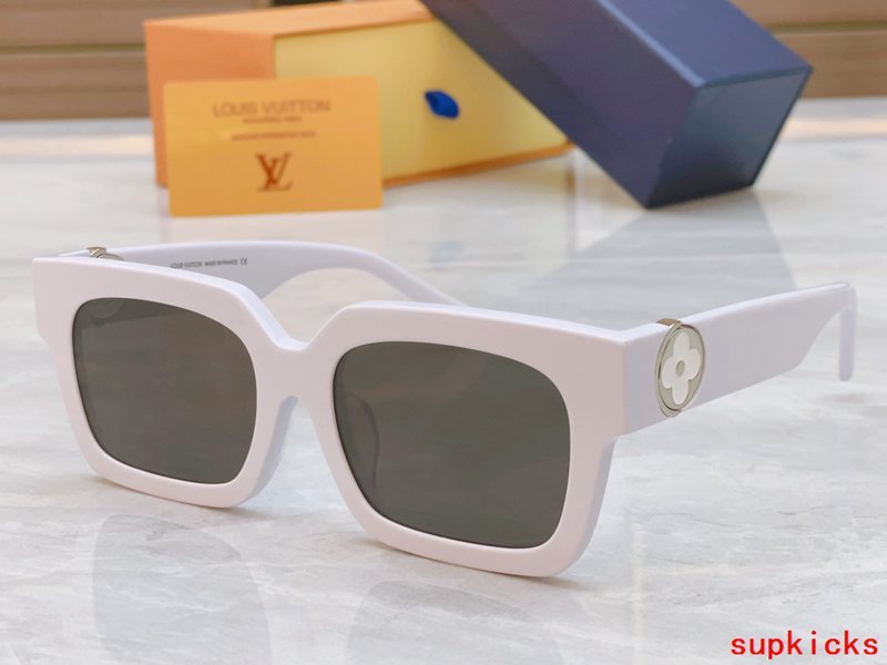 Close-up detail view of Louis Vuitton unisex sunglasses
