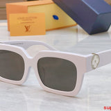 Close-up detail view of Louis Vuitton unisex sunglasses
