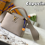 Front view of classic sleek women's handbag – women's luxury accessory