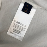Flat lay presentation of Louis Vuitton cotton t-shirt with tailored silhouette