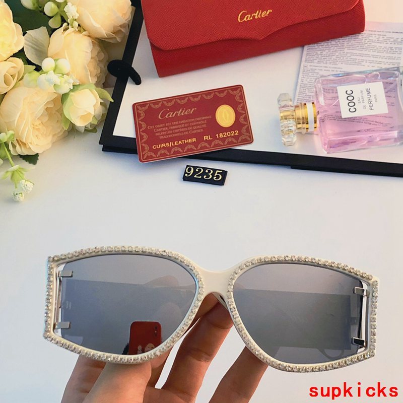 Close-up detail view of Cartier unisex sunglasses