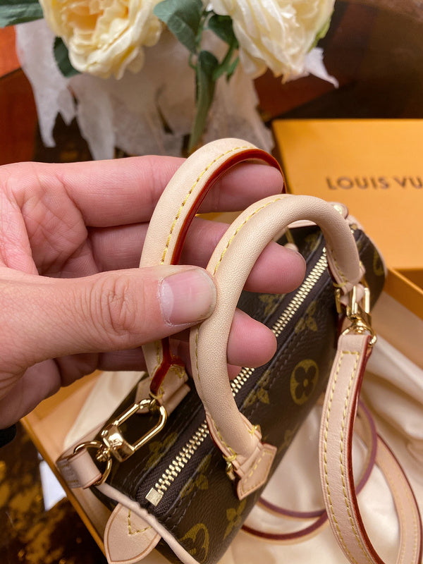 Back view of chic sleek women's handbag – women's statement bag