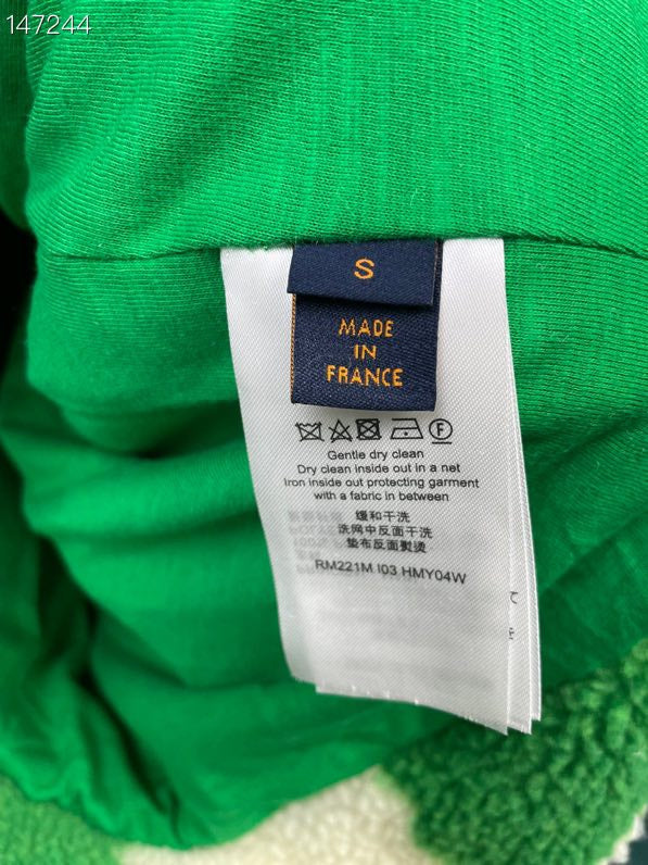 Back view of Louis Vuitton luxury clothing with signature branding