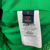 Back view of Louis Vuitton luxury clothing with signature branding