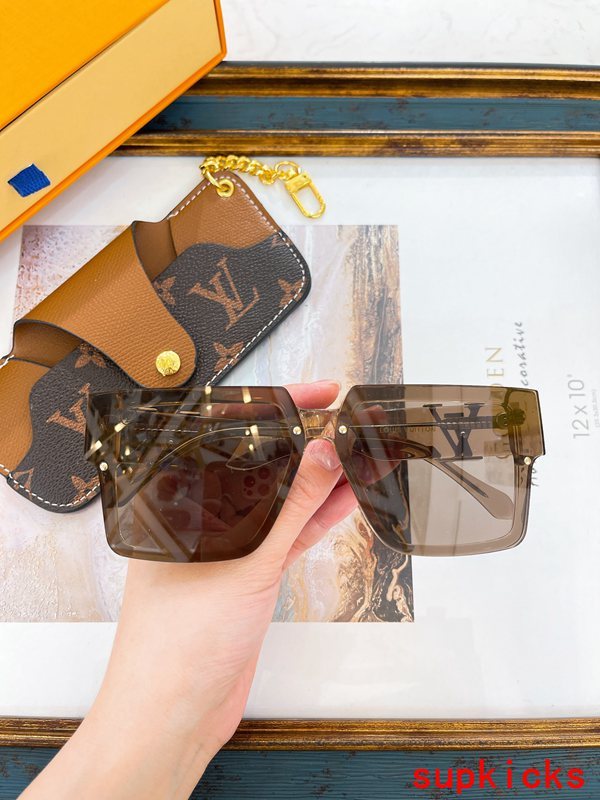 Close-up detail view of Louis Vuitton unisex sunglasses