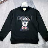 Front view of Gucci luxury clothing with signature branding