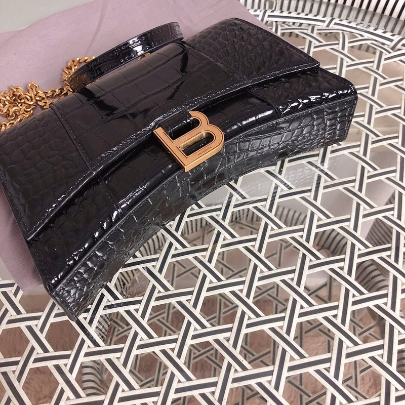 Back view of structured modern women's handbag – women's luxury accessory