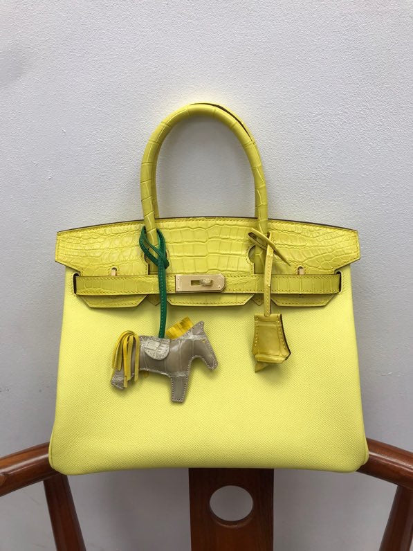  Elegant structured bag carried on shoulder 100