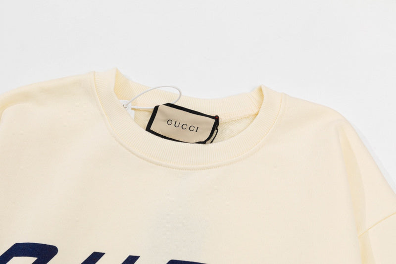 Close-up detail shot of Gucci luxury clothing with relaxed-fit cut