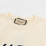 Close-up detail shot of Gucci luxury clothing with relaxed-fit cut