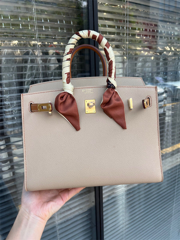 Side view of modern structured handbag