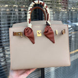 Side view of modern structured handbag