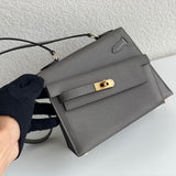 Side view of clean-lined structured handbag
