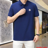 Flat lay presentation of Moncler luxury clothing with contemporary cut