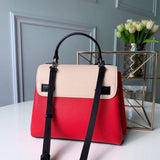 Close-up detail of chic polished women's handbag – women's statement bag