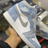 Side profile of Nike crisp white sneakers retro runner design