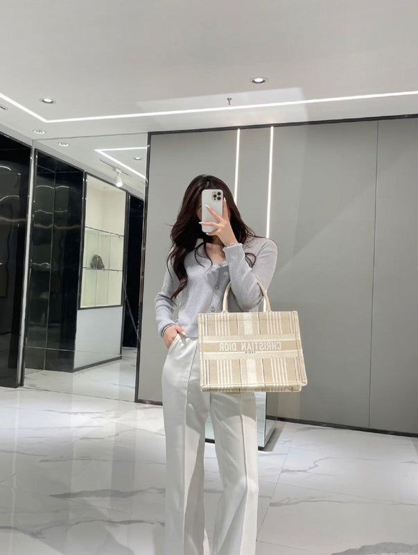 Front view of modern statement women's handbag – women's luxury accessory