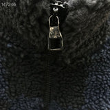 Back view of Louis Vuitton luxury clothing with signature branding