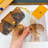 Lifestyle view of Louis Vuitton unisex sunglasses