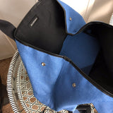 Styled lifestyle shot of elevated statement women's handbag – women's designer-style accessory