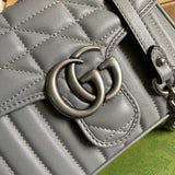 Back view of statement polished women's handbag – women's luxury accessory
