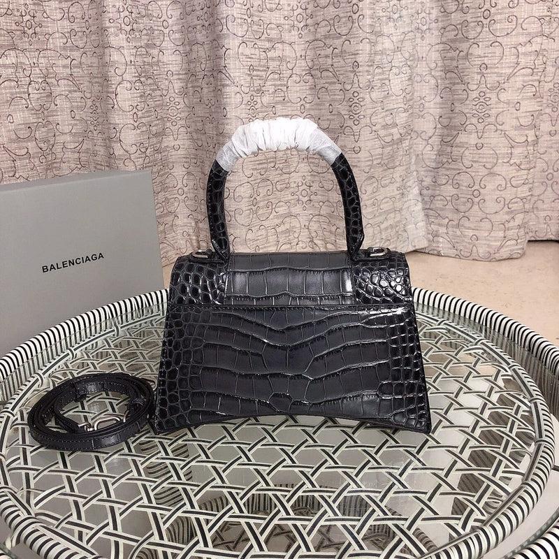 Styled lifestyle shot of refined signature women's handbag – women's designer-style accessory
