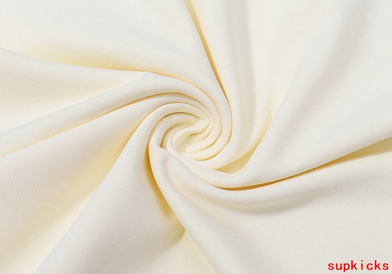 Close-up detail shot of Rhude luxury clothing with streetwear-inspired cut