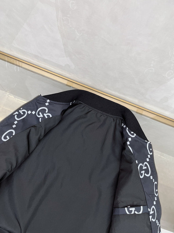 Flat lay presentation of Gucci luxury clothing with logo-detail design