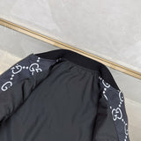 Flat lay presentation of Gucci luxury clothing with logo-detail design