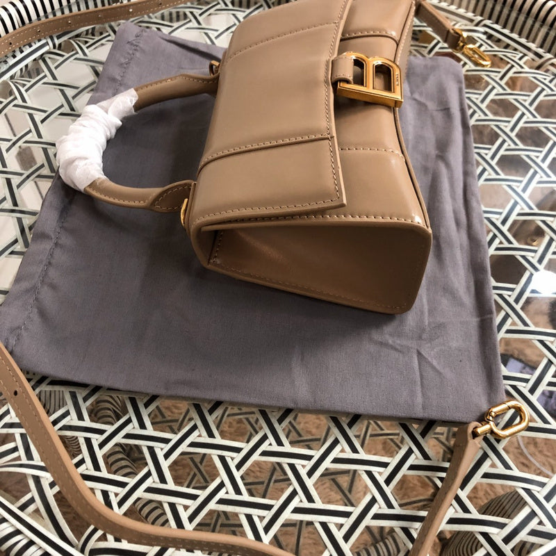 Top view of modern sleek women's handbag – women's luxury accessory