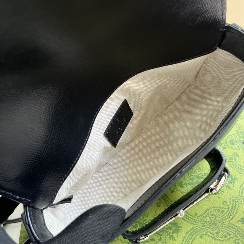 Close-up detail of statement sleek women's handbag – women's luxury accessory