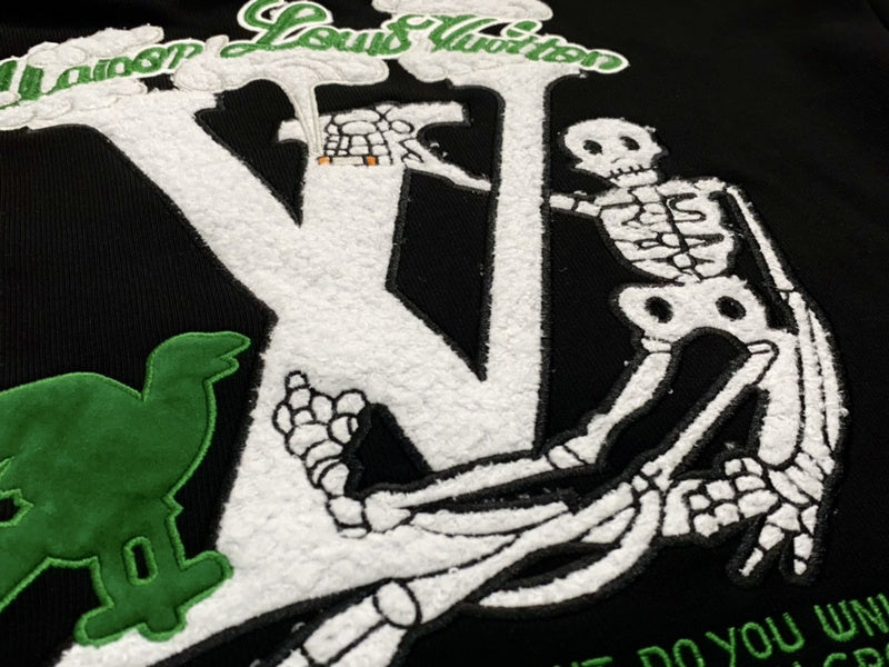Close-up detail shot of Louis Vuitton luxury clothing with contemporary cut