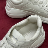 Gucci soft grey luxury sneakers view 5 bold athletic profile