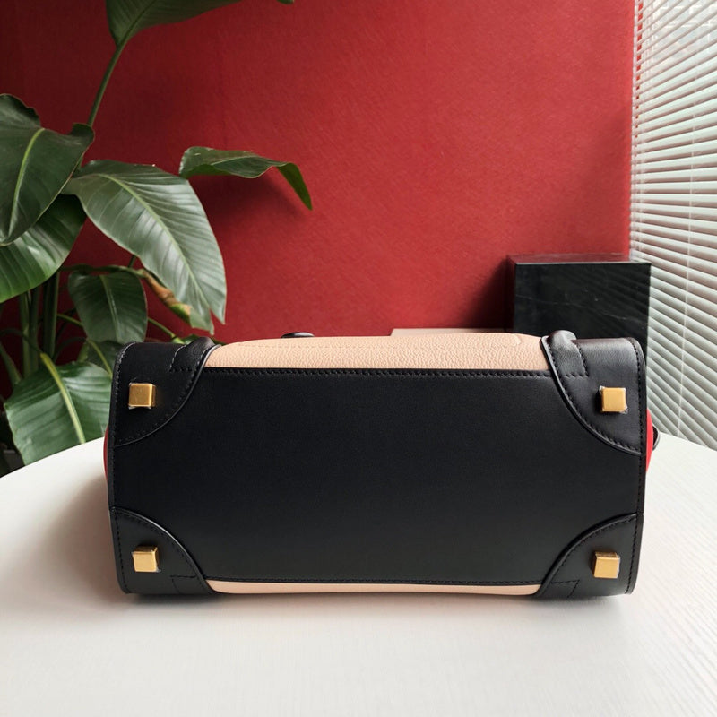 Front view of modern structured women's handbag – women's luxury accessory