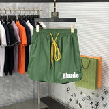 Front view of Rhude luxury clothing with label-forward styling