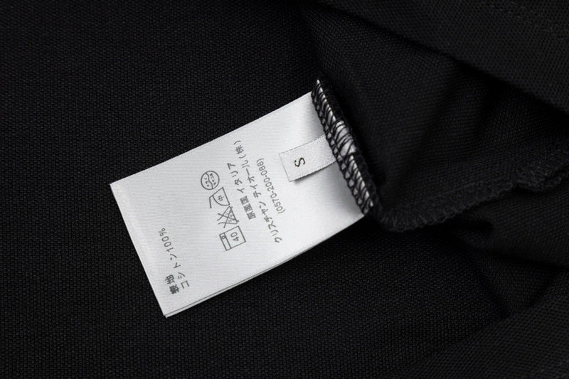Close-up detail shot of Polo cotton polo shirt with logo-detail design
