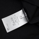 Close-up detail shot of Polo cotton polo shirt with logo-detail design