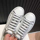 Alexander McQueen soft grey luxury sneakers view 7 chunky sole construction
