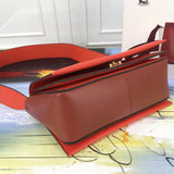 Back view of classic polished women's handbag – women's luxury accessory