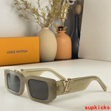 Close-up detail view of Louis Vuitton unisex sunglasses