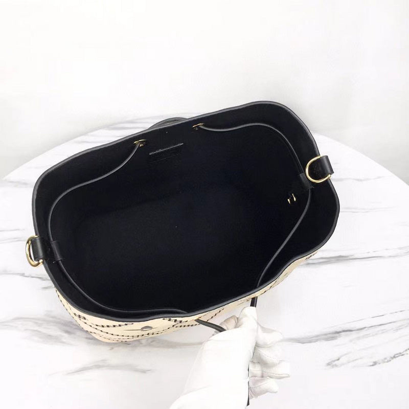 Handle and strap detail of structured refined women's handbag – women's luxury handbag